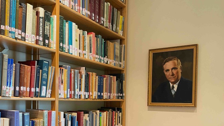 Photo of library with Geoffrey Hodson picture